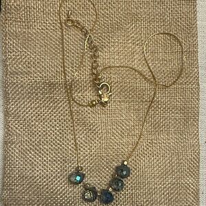 Elegant Gold necklace with blue glass stones